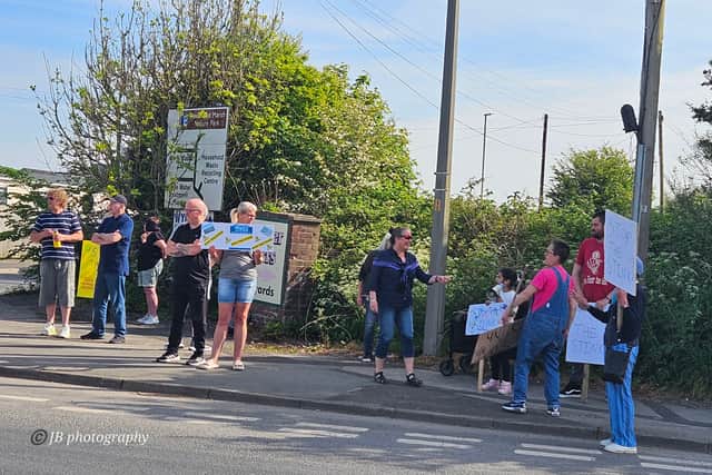 Protesters at the entrance to the landfill site on Jameson Road, Fleetwood, on Saturday.
