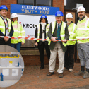 Fleetwood Trust CEO Charley Wilkinson at the former Fleetwood Hospital building with Lord Tom McNally, Chair of the Fleetwood Trust, John Hartley, CEO of Fleetwood Town Community Trust, with contractors Kroll Corlett Construction as work continues on the new Youth Hub. Inset a model showing how it will look