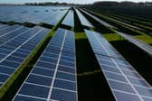 Photovoltaic (PV) solar panels making up Manston Solar Farm in south-east England. (Photo by DANIEL LEAL/AFP via Getty Images)