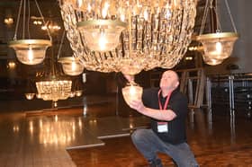 The Winter Gardens’ iconic Empress Ballroom has reached a significant milestone as the final two chandeliers have been winched back into place, ready to light up this year’s spectacular Dance Festival.