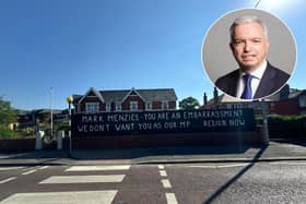 A new sign declaring local MP Mark Menzies an “embarrassment” has sparked a mixed reaction from residents (Credit: Dave Nelson)