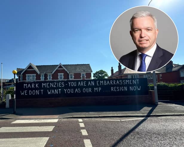 A new sign declaring local MP Mark Menzies an “embarrassment” has sparked a mixed reaction from residents (Credit: Dave Nelson)
