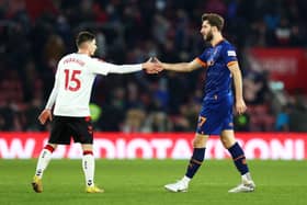 Charlie Goode (R) was at Blackpool last season. Brentford have released him after his loan spell at Wigan Athletic. (Photo by Bryn Lennon/Getty Images)