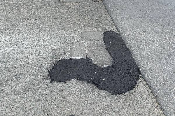 An example of the 'blobbing' technique of pothole-filling in Preston - but will repairs like this last?  