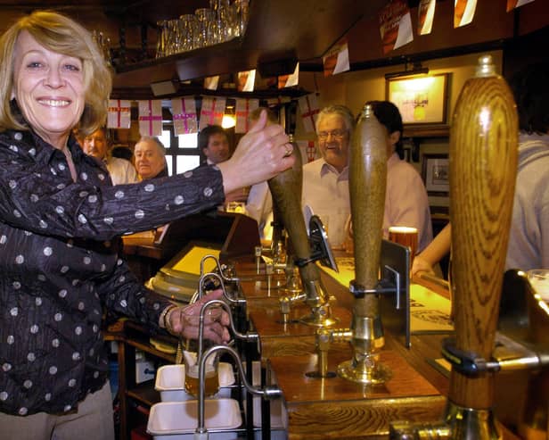 Val Ballantyne, pictured pulling her last pint after 16 years at The Thatched.