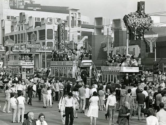 A view of the promenade crowds and historical trams near Coral Island during the Tramway Centenary celebrations in 1985