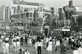 A view of the promenade crowds and historical trams near Coral Island during the Tramway Centenary celebrations in 1985