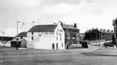 Originally a farm with a licence, the Gynn Inn, seen in this view from the early 1900s, looking towards Dickson Road, was demolished in 1921. The sale of fixtures and fittings of the old inn raised £30, with eight cast iron spittoons being sold for one shilling. The Duke of Cambridge Hotel to it's right was rebuilt as the present day Gynn, but the terrace of houses on the right still remains, some as homes others as businesses