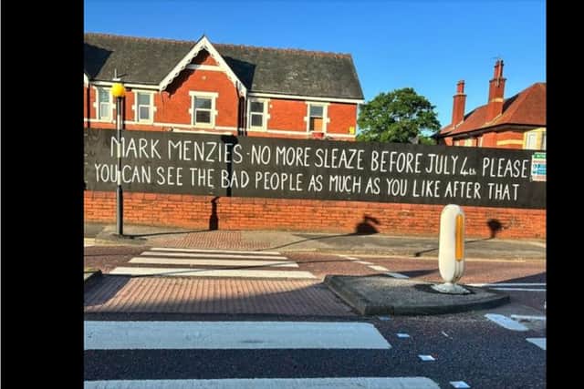 It is the third message for Mark Menzies to appear outside the address in Clifton Drive, Ansdell since the scandal which saw the Fylde MP suspended from the Conservative Party last month. Credit: Kath Coops