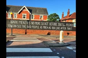 It is the third message for Mark Menzies to appear outside the address in Clifton Drive, Ansdell since the scandal which saw the Fylde MP suspended from the Conservative Party last month.Credit: Kath Coops