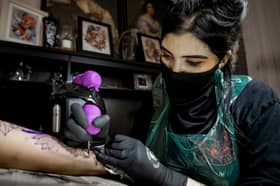 A new study has suggested tattoos could increase the risk of certain types of cancer. Picture: PA