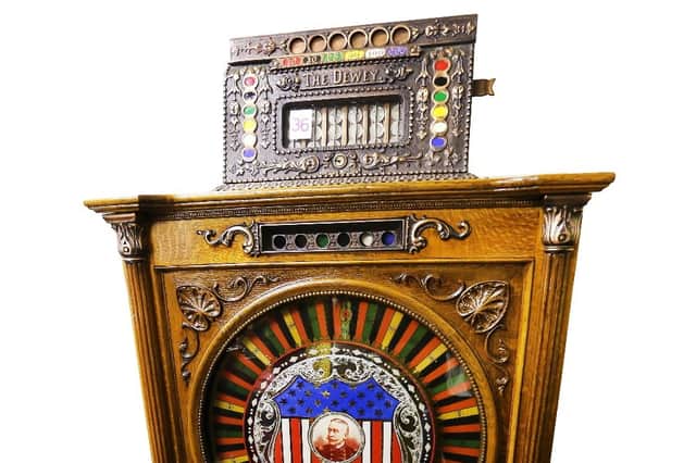 Lot 36 Mills Novelty Company Dewey 1898 floor roulette machine and its estimate is £15,000-£20,000