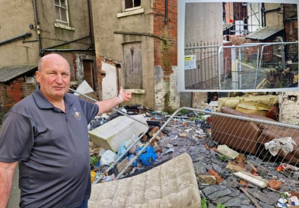 Steve Savage pictured on a previous occasion outside the still derelict former Pennines Hotel on Havelock Street