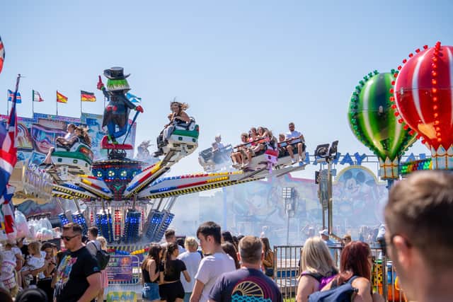 People enjoying the rides at Poulton Gala last year