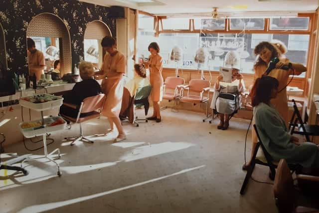Purple Curl in Birley House had changed to Connect Progressive Hairdressing in 1992. As well as ladies hair dressing it was also offering a new barber-style salon for men. Peach colour scheme...