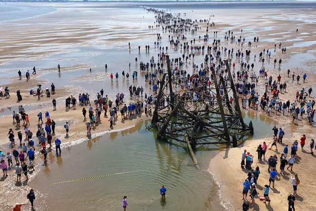 Overhead photo shows the wheel-like design of Wyre Light's base as walkers gather around during Wreck Trek 2024. Photo: Alan Knowler