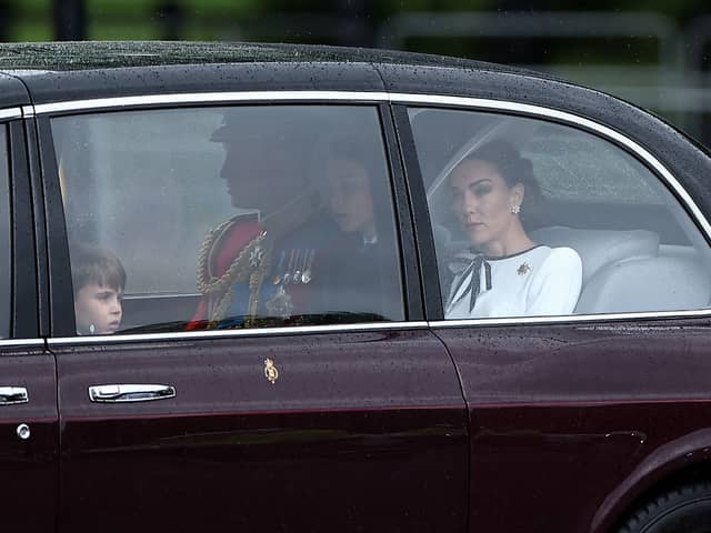 Catherine, Princess of Wales  arrives with Prince William, Prince of Wales  and their children Prince George and Prince Louis of Wales to Buckingham Palace before the King's Birthday Parade "Trooping the Colour". (Photo by HENRY NICHOLLS/AFP via Getty Images)