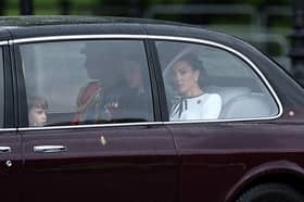 Catherine, Princess of Wales  arrives with Prince William, Prince of Wales  and their children Prince George and Prince Louis of Wales to Buckingham Palace before the King's Birthday Parade "Trooping the Colour". (Photo by HENRY NICHOLLS/AFP via Getty Images)