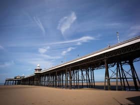 A visitor to Blackpool and his daughter, who was in a motorised wheelchair, got stuck uner North Pier as the tide came in