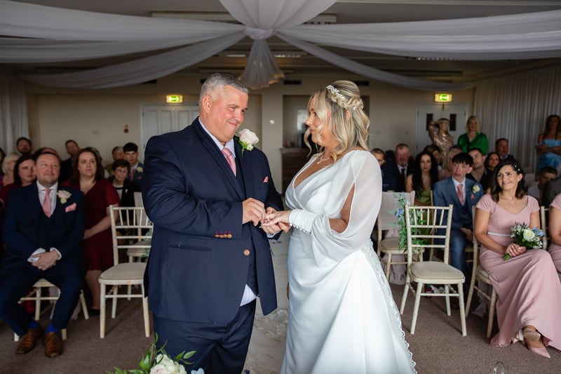 Alan and Leanne exchange vows at a ceremony which was 'beautiful'. "Our boys ushered everyone to the ceremony room overlooking the promenade"