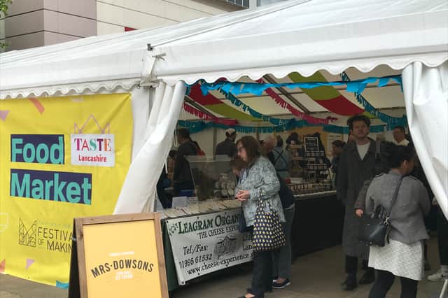 People are shopping at the Festival of Taste Market 