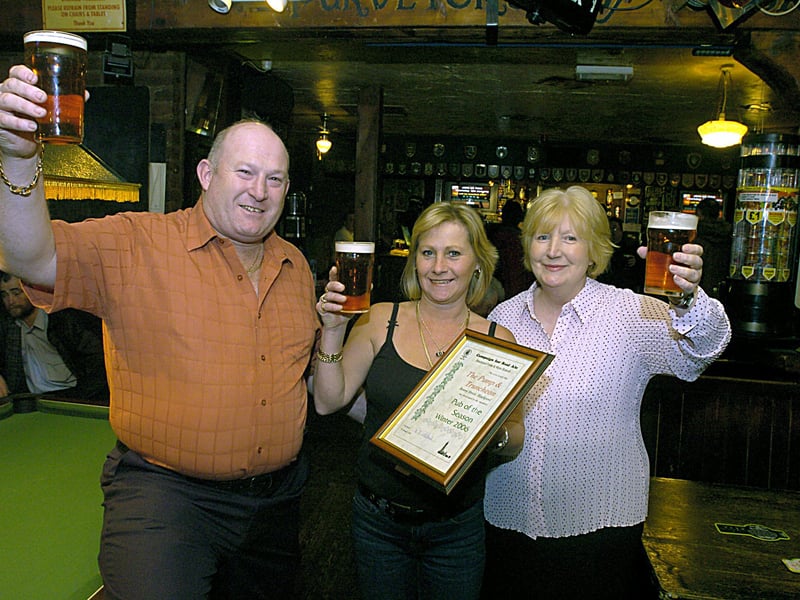 Keith Slater and Barbara Savage of the Pump and Truncheon, Bonny Street, celebrate winning the Camra Pub of the Winter award with Blackpool, Wyre and Fylde Camra Branch Chairman, Rose Gledhill (right).