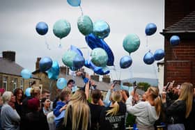 Friends and people from the local community who knew the family released dozens of blue balloons into the sky on Tuesday, 16 July, in memory of the 19-year-old who disappeared on the Spanish island almost a month ago. Credit: P L Photography And Images 