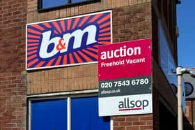 A notice on B&M in Cleveleys says the building in Princess Road is up for auction. Credit: Ian Straughan
