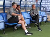 Neil Critchley with coaches Mike Garrity and Richard Keogh (Photographer Lee Parker / CameraSport)