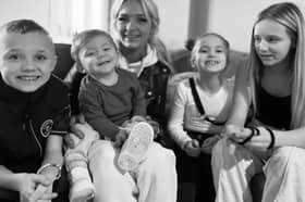 Laura McFarlane and her six children rushed to safety after a fire at their home on Lindel Road on Monday evening. 