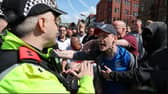 Protesters initially gathered outside Blackpool cenotaph before marching through the town. Credit: PA