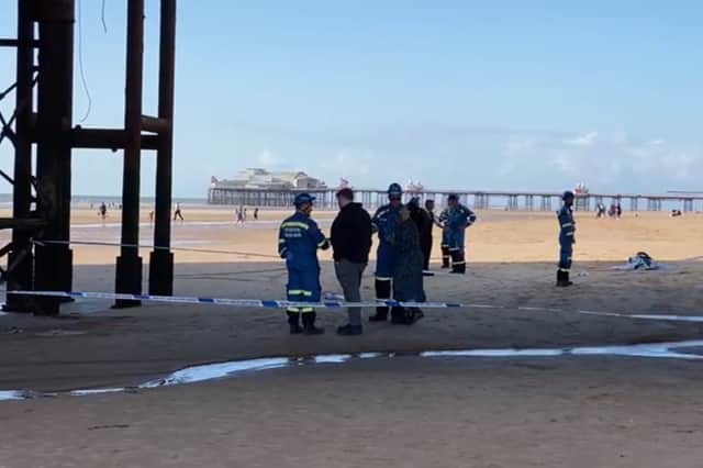 Investigators below Central Pier following the incident