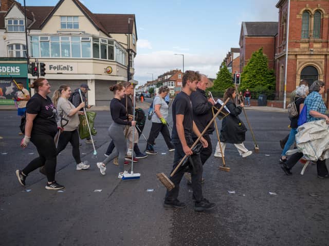 Members of the Middlesbrough community come together to clean up their streets after far-right activists destroyed property following riots on 5 August (Photo: Ian Forsyth/Getty Images)