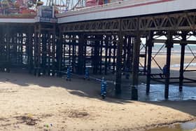 Eyewitnesses feared a woman had died after she fell through a large gap on Central Pier in Blackpool