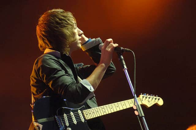 Arctic Monkeys onstage at Bramham Park, Leeds, for the 2006 Carling Leeds Festival. The festival made the move to the new site after the fallout from the Temple Newsam Riots in 2003 and remains at the location to this day.