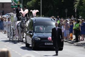 The funeral procession of nine-year-old Alice Da Silva Aguiar arrives for her funeral, a victim of last week's knife attack in Southport, outside St Patrick's Catholic Church.