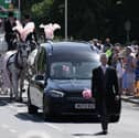 The funeral procession of nine-year-old Alice Da Silva Aguiar arrives for her funeral, a victim of last week's knife attack in Southport, outside St Patrick's Catholic Church.