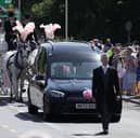 The funeral procession of nine-year-old Alice Da Silva Aguiar arrives for her funeral, a victim of last week's knife attack in Southport, outside St Patrick's Catholic Church.