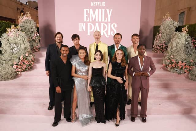 (L-R) Lucas Bravo, Lucien Laviscount, Paul Forman, Ashley Park, Bruno Gouery, Lily Collins, William Abadie, Philippine Leroy-Beaulieu, Arnaud Binard, and Samuel Arnold attend the Emily In Paris Season 4 Part 1 LA Premiere at The Egyptian Theatre Hollywood on August 14, 2024. (Photo by Matt Winkelmeyer/Getty Images for Netflix)
