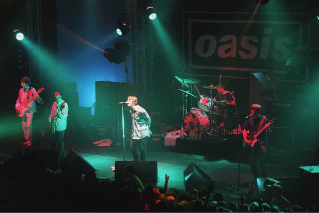Liam and Noel Gallagher are to go on tour as Oasis again (Photo by Brian Rasic/Getty Images)