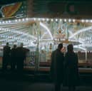 People watching the dodgem cars at night, at Blackpool Pleasure Beach, Blackpool, Lancashire, UK, circa 1955. (Photo by Hulton Archive/Getty Images) | Getty Images
