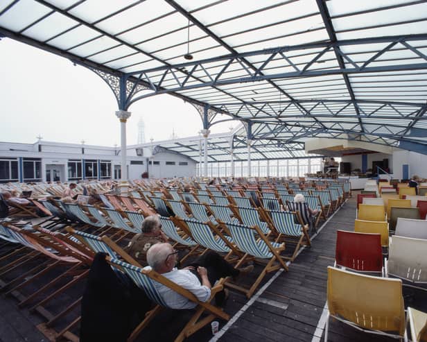Elderly holidaymakers enjoy a sparsely attended musical performance in the seaside town of Blackpool, Lancashire, August 1983