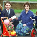 Youngsters at Mereside Primary School nursery benefitted from hundreds of pounds-worth of outdoor equipment, thanks to a donation from Royal Mail in 2000 Pic L-R: Simone Threlfall (3), Royal Mail Area Manager Robert Wilson, Nursery Teacher Christine Davies, and Nicole Menzies (4)
