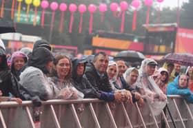 Soggy music fans at BBC Radio 2 in the Park on Sunday