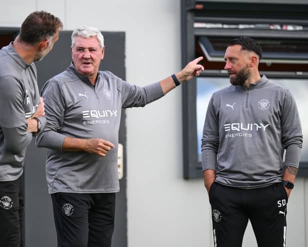 Steve Bruce with Richard Keogh and Stephen Dobbie 