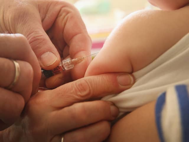 A child is given their MMR vaccination. (Photo: Sean Gallup/Getty Images)