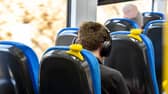 A customer on-board a Northern train.