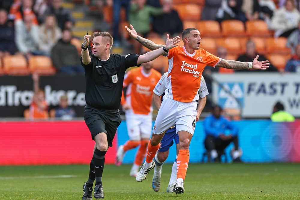 Ollie Norburn is set to miss out on Blackpool’s next League One game. (Image: CameraSport - Lee Parker)