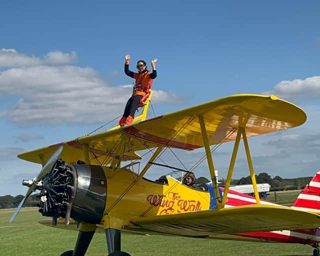 Lucy Sladen doing her aeroplane 'wing walk for South East Dog Rescue (SEDR)