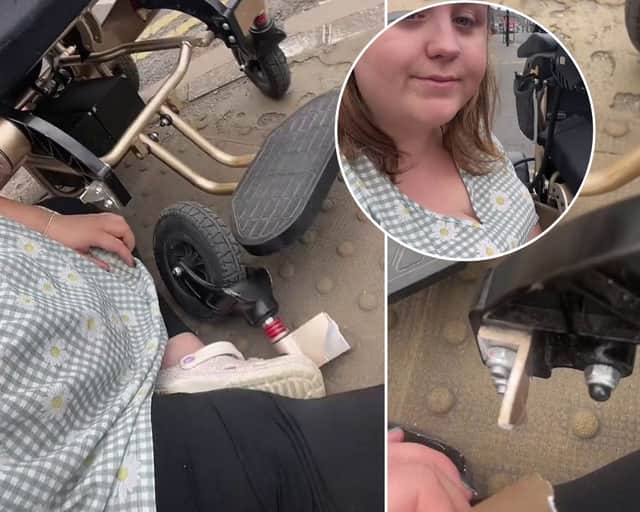 Abbie McMahon, 25, claims she was flung from her wheelchair when the wheel broke after getting stuck in a dropped kerb.